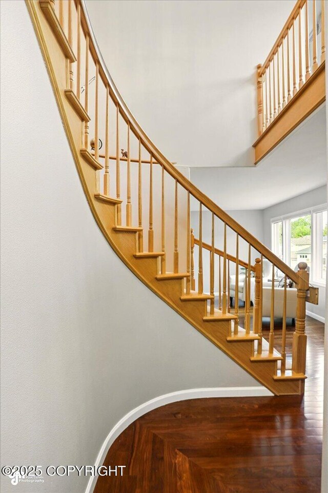 3833 Eastwind Dr, Anchorage, AK 99516 - staircase with a high ceiling and wood finished floors