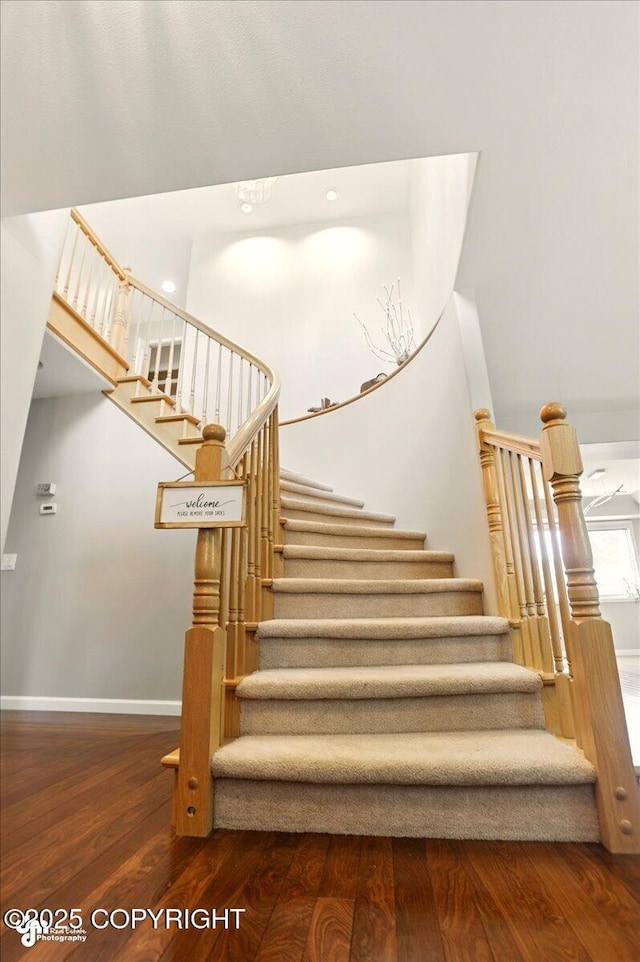 3833 Eastwind Dr, Anchorage, AK 99516 - stairs with wood finished floors and baseboards