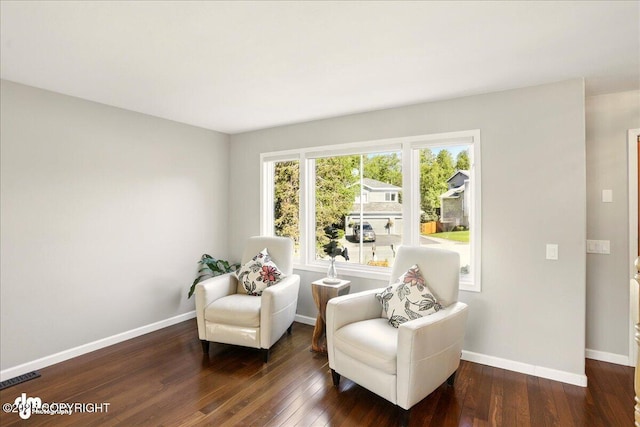 3833 Eastwind Dr, Anchorage, AK 99516 - sitting room featuring baseboards and wood-type flooring
