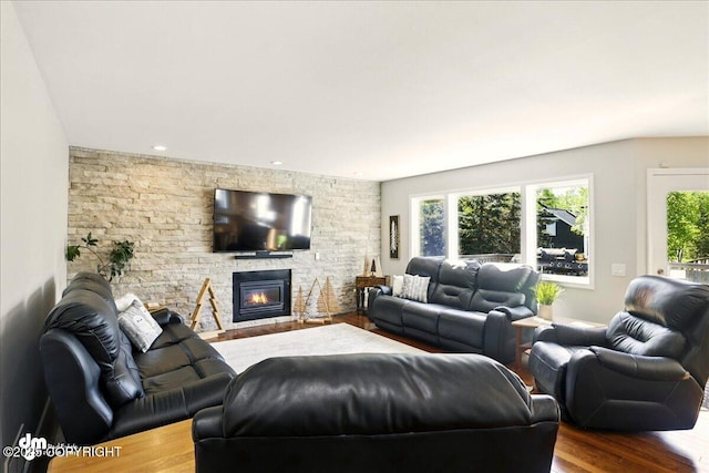 3833 Eastwind Dr, Anchorage, AK 99516 - living area featuring plenty of natural light, wood finished floors, a fireplace, and recessed lighting