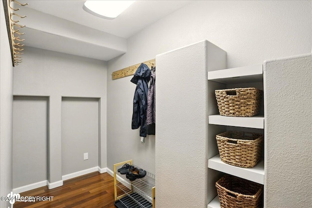3833 Eastwind Dr, Anchorage, AK 99516 - mudroom featuring dark wood-style floors and baseboards