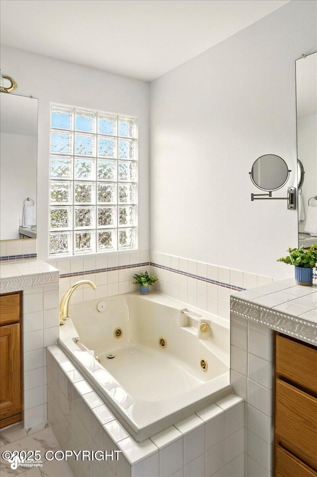 3833 Eastwind Dr, Anchorage, AK 99516 - bathroom with vanity and a tub with jets