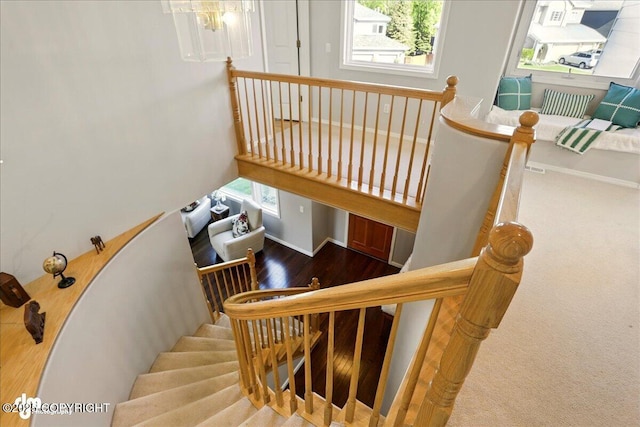 3833 Eastwind Dr, Anchorage, AK 99516 - stairs featuring wood finished floors and baseboards
