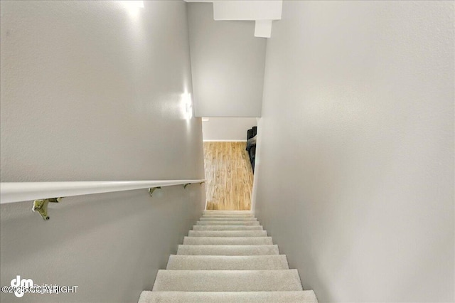 3833 Eastwind Dr, Anchorage, AK 99516 - stairs featuring wood finished floors