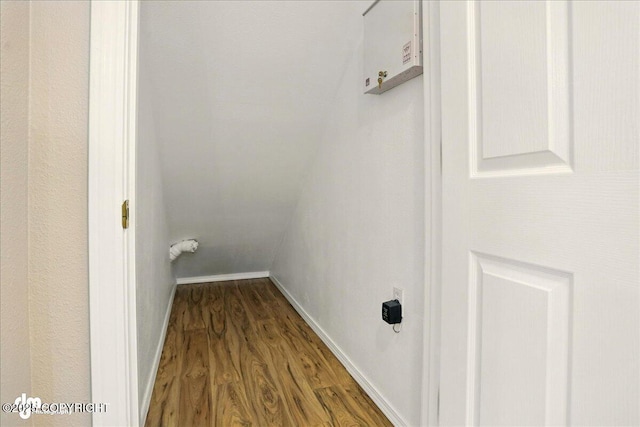 3833 Eastwind Dr, Anchorage, AK 99516 - laundry room featuring wood finished floors and baseboards