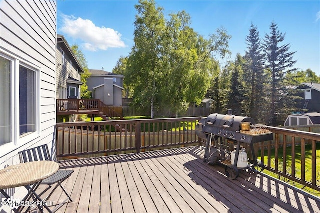 3833 Eastwind Dr, Anchorage, AK 99516 - wooden terrace featuring stairway and area for grilling