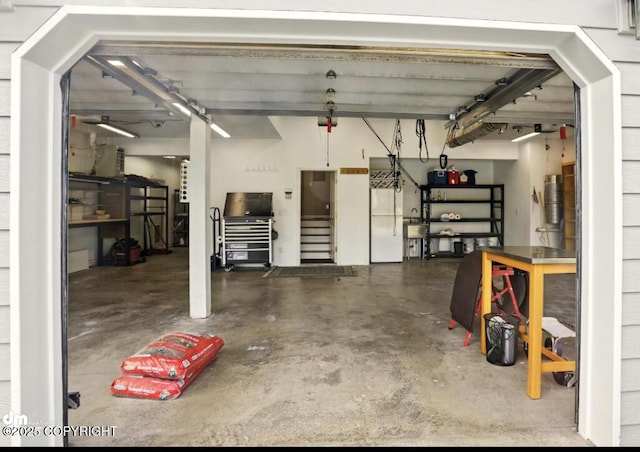 3833 Eastwind Dr, Anchorage, AK 99516 - garage featuring a central vacuum unit