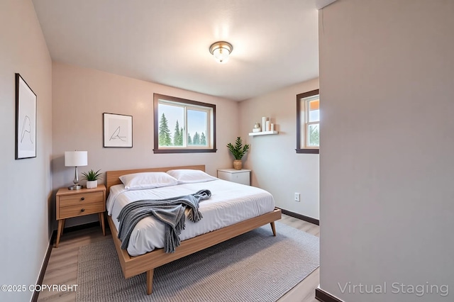 33533 Alder St, Anchor Point, AK 99556 - bedroom featuring light wood-style flooring and baseboards