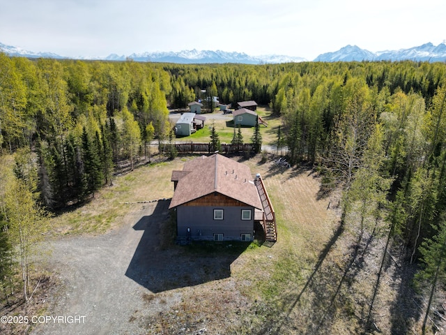 5670 W Calico Dr, Wasilla, AK 99654 - view of subject property with a forest and mountains