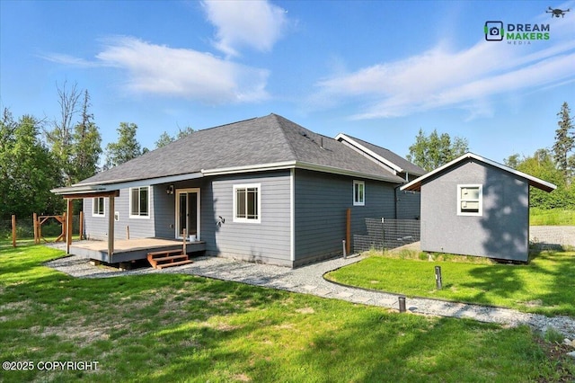 7782 W Arlie Rd, Wasilla, AK 99623 - rear view of property with a wooden deck and an outdoor structure