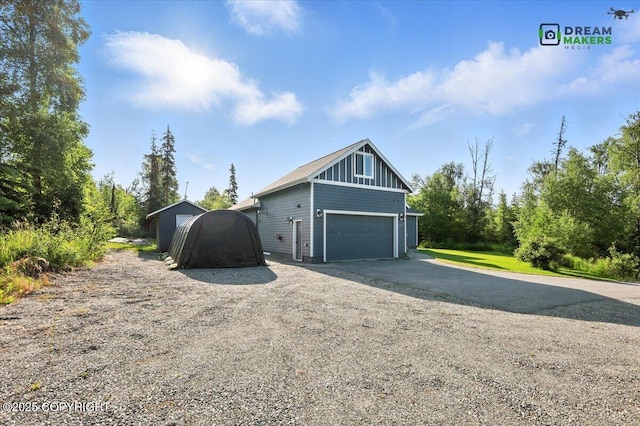 7782 W Arlie Rd, Wasilla, AK 99623 - garage featuring driveway