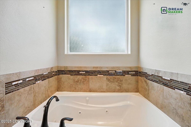 7782 W Arlie Rd, Wasilla, AK 99623 - bathroom with a tub with jets