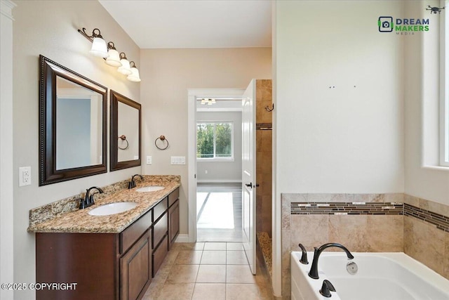 7782 W Arlie Rd, Wasilla, AK 99623 - full bath with a bath, double vanity, and tile patterned floors