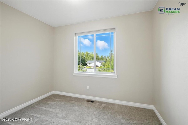 7782 W Arlie Rd, Wasilla, AK 99623 - carpeted spare room featuring baseboards