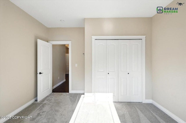 7782 W Arlie Rd, Wasilla, AK 99623 - unfurnished bedroom with carpet and a closet