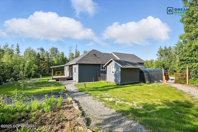 7782 W Arlie Rd, Wasilla, AK 99623 - back of property with a storage shed