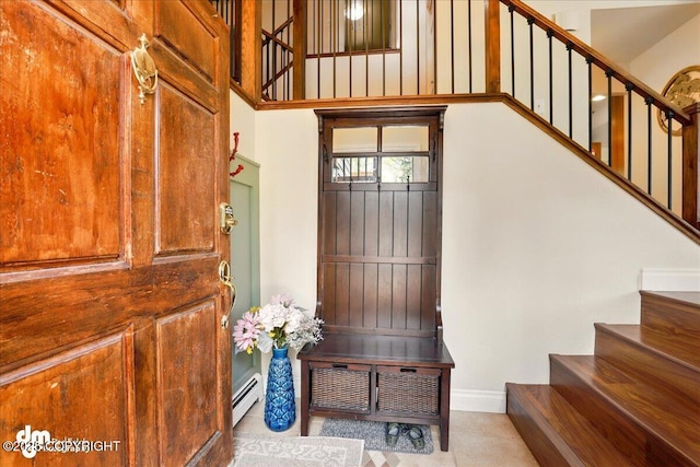 mudroom featuring baseboard heating and baseboards