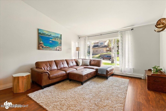 living room with baseboard heating, wood finished floors, and baseboards