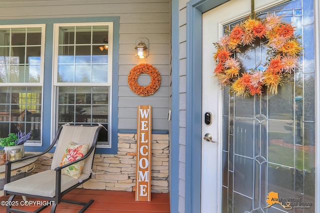 property entrance featuring covered porch