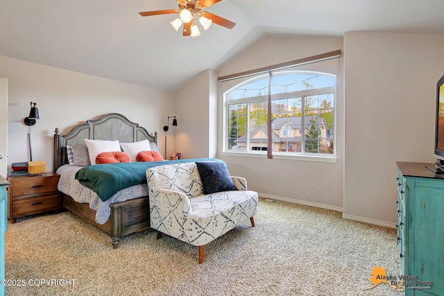 bedroom featuring light colored carpet, lofted ceiling, baseboards, and ceiling fan