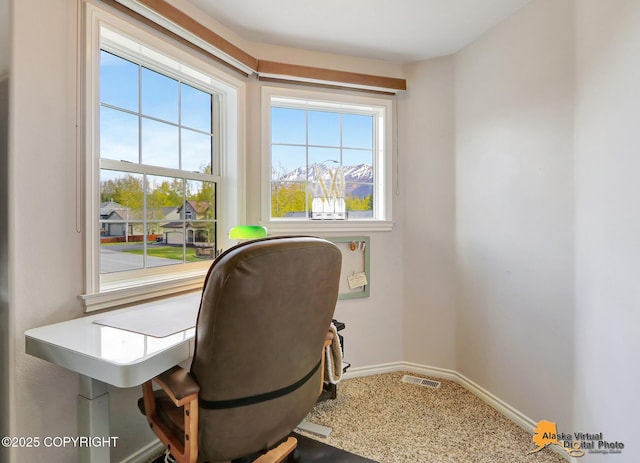 office area with healthy amount of natural light and baseboards