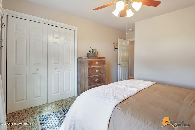 bedroom featuring a closet and a ceiling fan