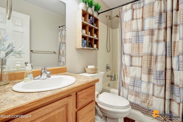 full bathroom with shower / tub combo with curtain, vanity, and toilet