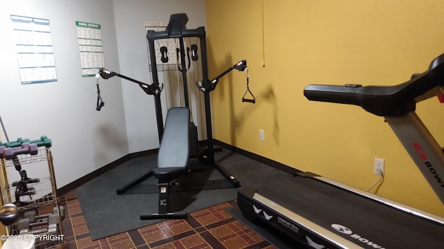 400 W 76th Ave # 204, Anchorage, AK 99518 - exercise room featuring baseboards