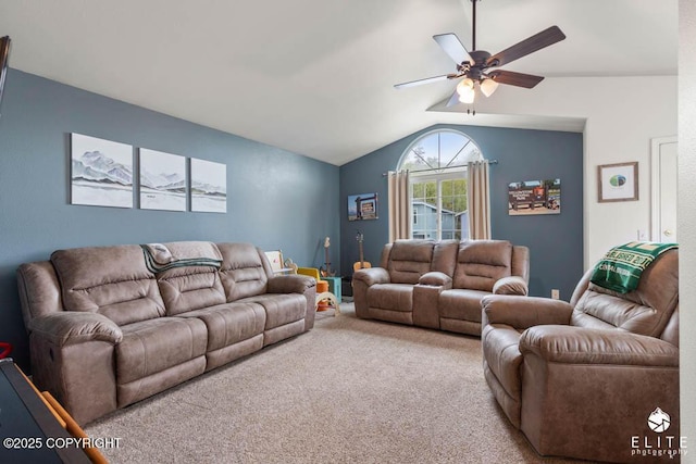 carpeted living area with vaulted ceiling and ceiling fan