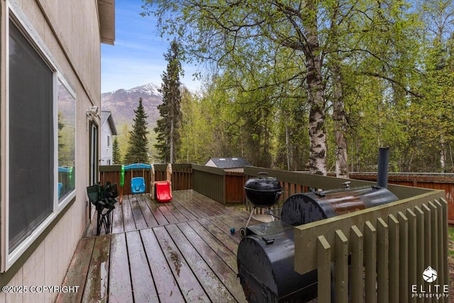 wooden terrace with a mountain view