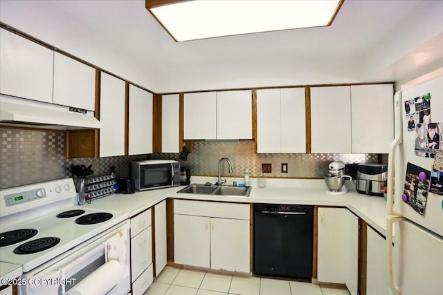 kitchen with black appliances, a sink, under cabinet range hood, light countertops, and white cabinets