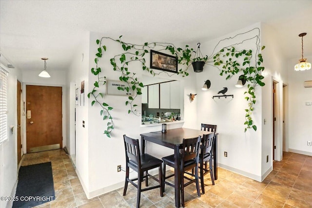 dining area with baseboards
