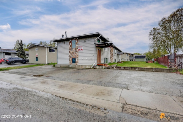 view of front of property with a residential view
