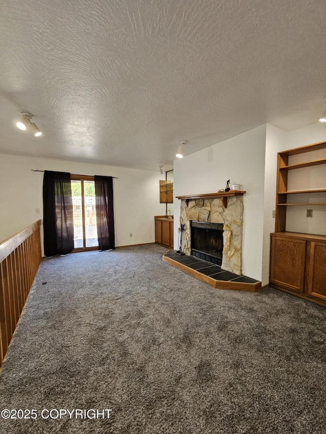 3213 Tayshee Cir, Anchorage, AK 99504 - unfurnished living room with a textured ceiling, carpet flooring, and a fireplace