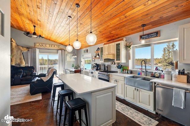 kitchen with appliances with stainless steel finishes, wood ceiling, a kitchen island, glass insert cabinets, and a sink