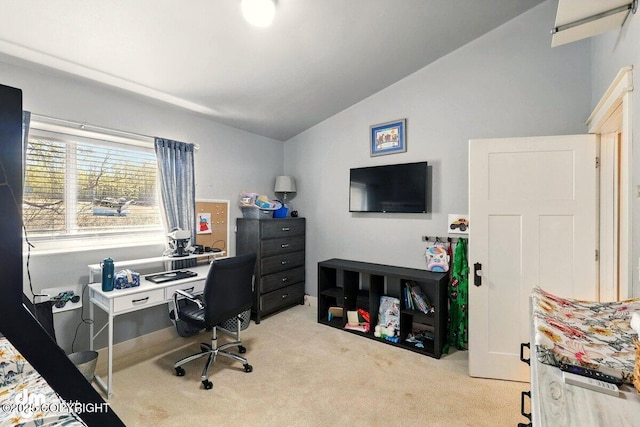office area with lofted ceiling and carpet flooring