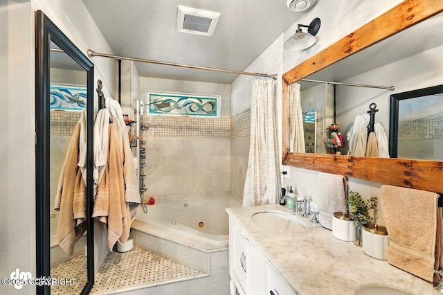 full bathroom featuring a combined bath / shower with jetted tub and double vanity