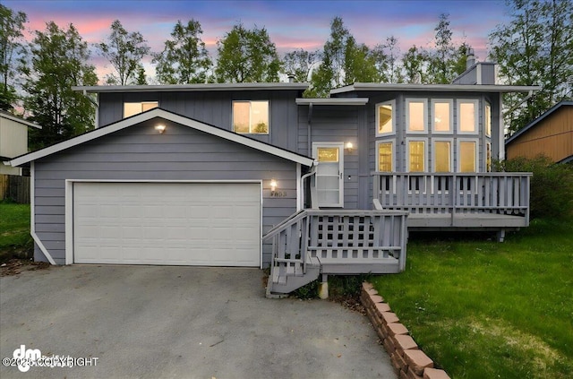 9033 W Parkview Terrace Loop, Eagle River, AK 99577 - view of front of property featuring a chimney, a garage, and a yard