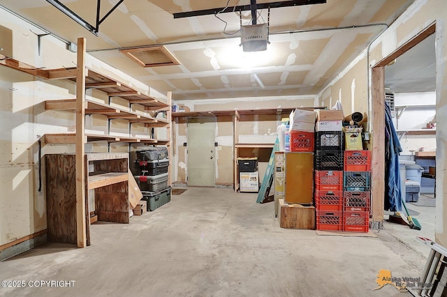 garage featuring a garage door opener