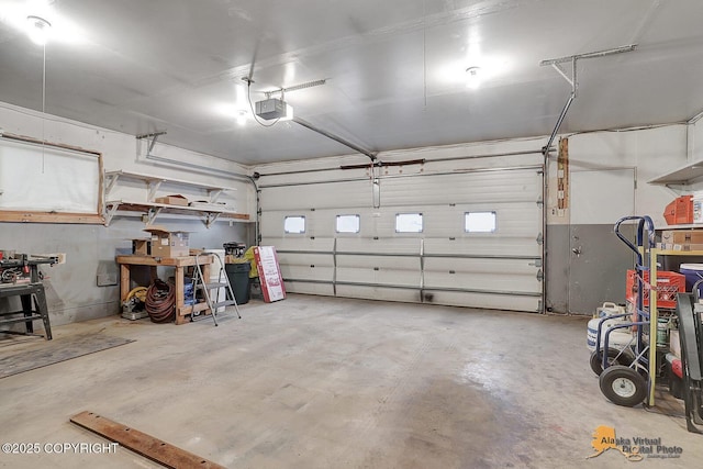 garage featuring a garage door opener