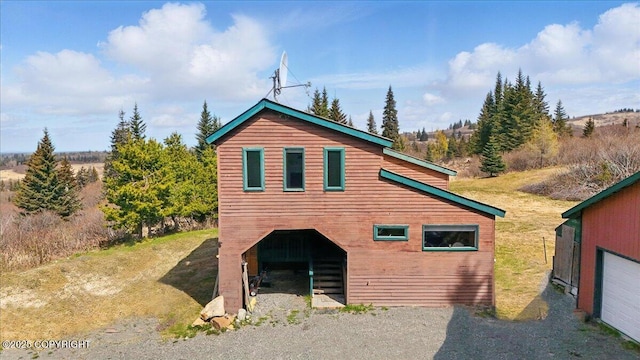 34540 Alamar, Anchor Point, AK 99556 - view of property exterior with an outbuilding