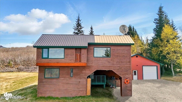 34540 Alamar, Anchor Point, AK 99556 - chalet / cabin with an outbuilding, driveway, and a garage