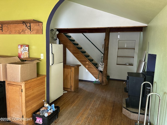 34540 Alamar, Anchor Point, AK 99556 - living area with dark wood-style floors, vaulted ceiling, stairway, and arched walkways