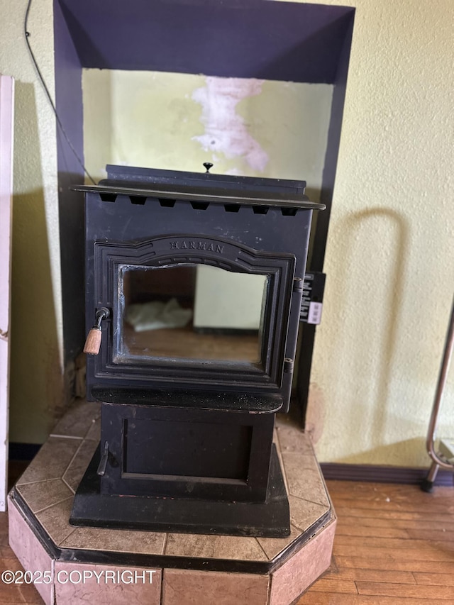 34540 Alamar, Anchor Point, AK 99556 - detailed view of a wood stove and wood finished floors