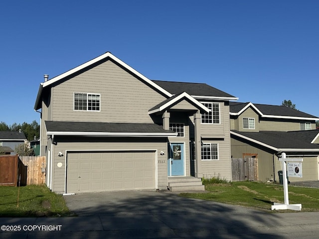 8662 Spruce Brook St, Anchorage, AK 99507 - traditional-style house featuring an attached garage and driveway