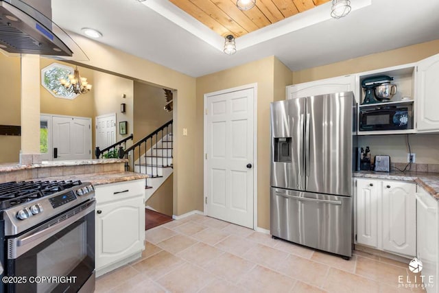 kitchen with stainless steel appliances, a chandelier, white cabinets, wooden ceiling, and a raised ceiling