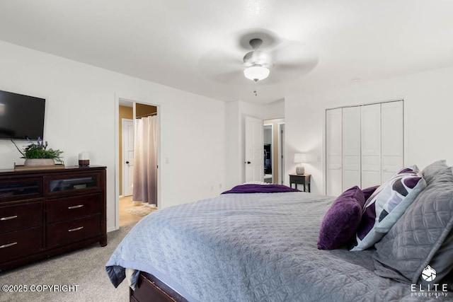 bedroom featuring light colored carpet, a closet, and ceiling fan