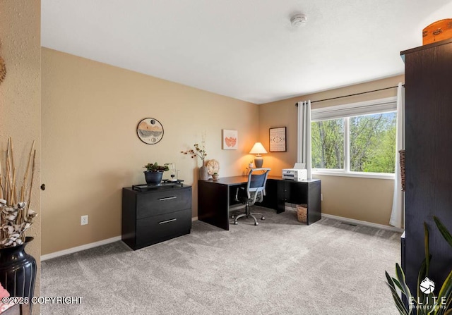 home office with carpet flooring and baseboards