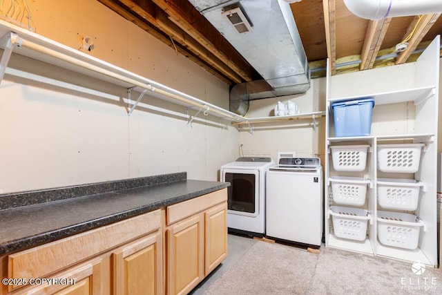 laundry area with washer and clothes dryer