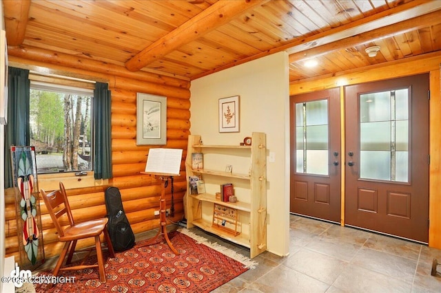 foyer entrance featuring rustic walls, wooden ceiling, french doors, and beamed ceiling